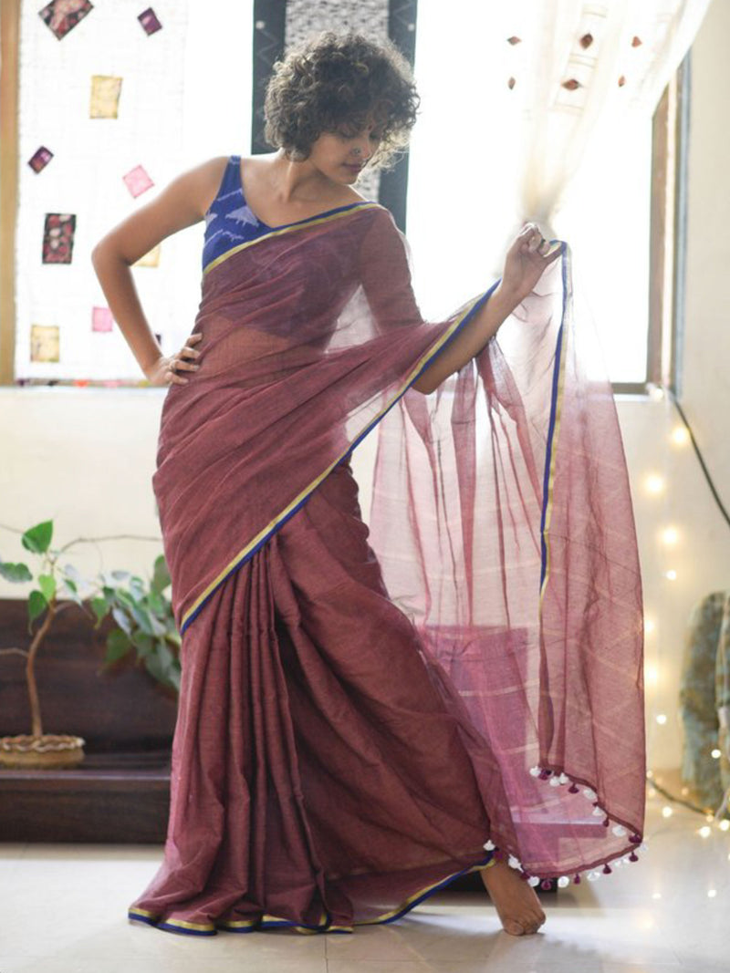 Brown mul with gold and blue border