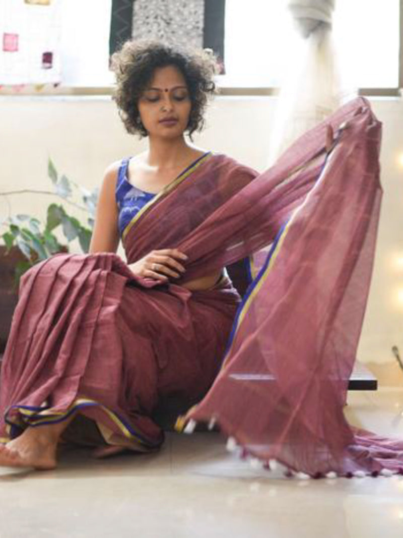 Brown mul with gold and blue border