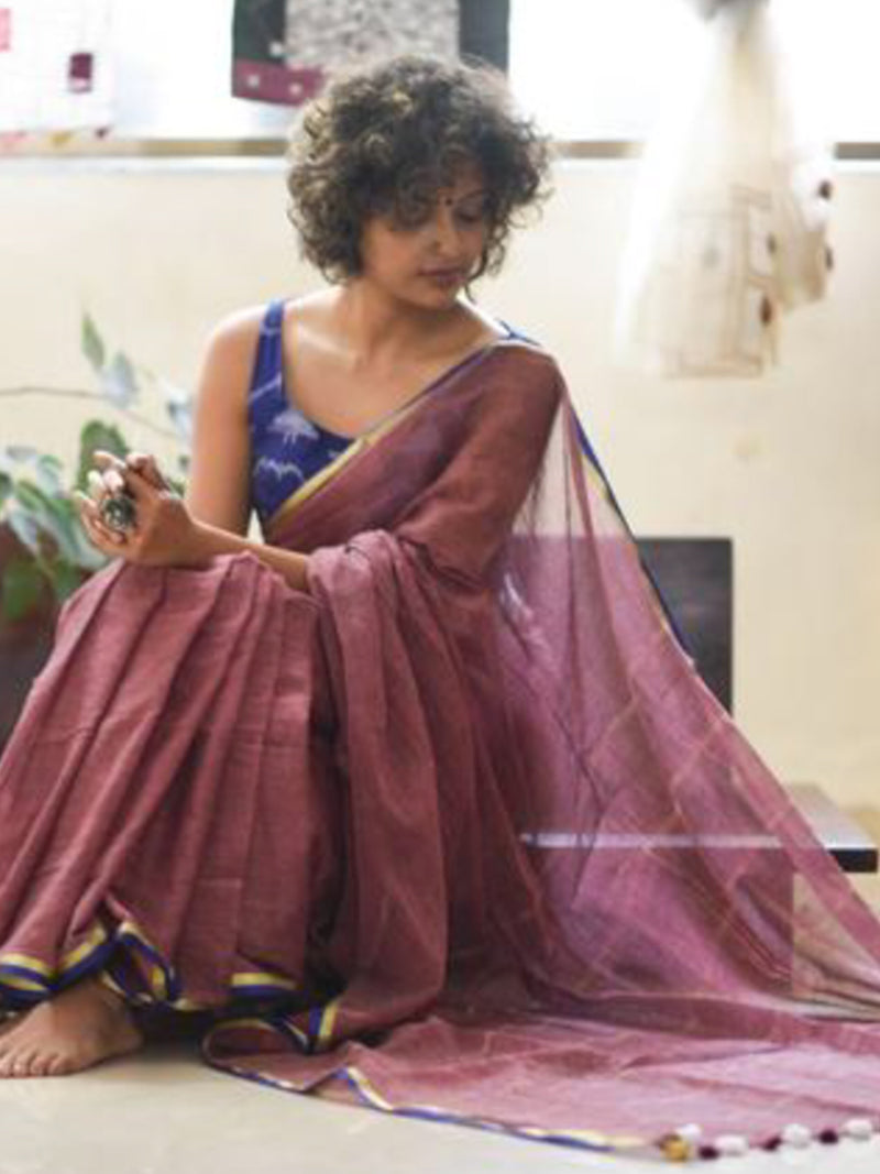 Brown mul with gold and blue border