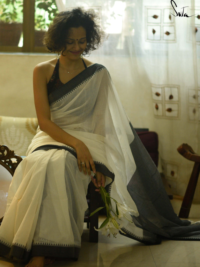 Divine black and white cotton saree wih kumbha
