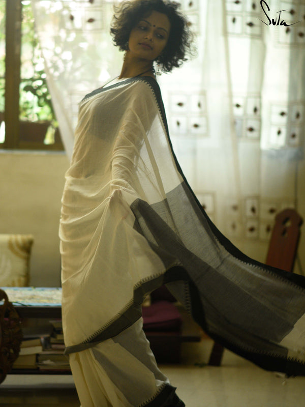 Divine black and white cotton saree wih kumbha