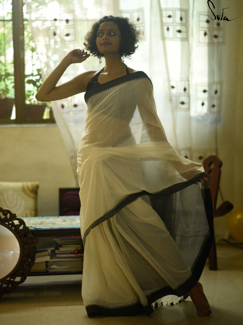 Divine black and white cotton saree wih kumbha