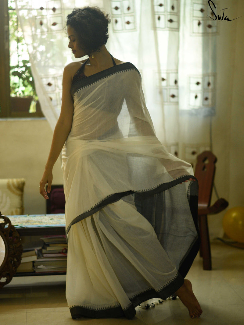 Divine black and white cotton saree wih kumbha
