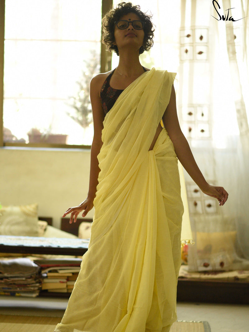 Lemon Yellow Mul cotton saree with pom pom