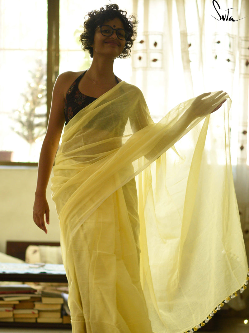 Lemon Yellow Mul cotton saree with pom pom