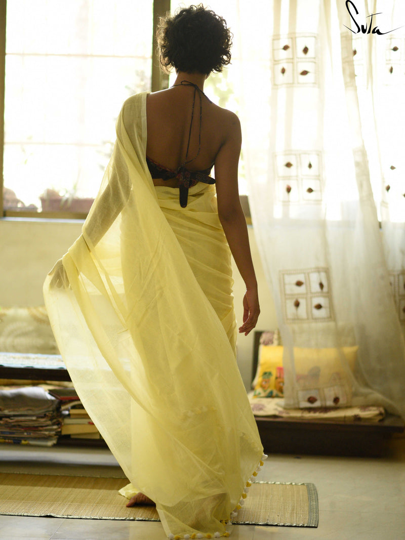 Lemon Yellow Mul cotton saree with pom pom