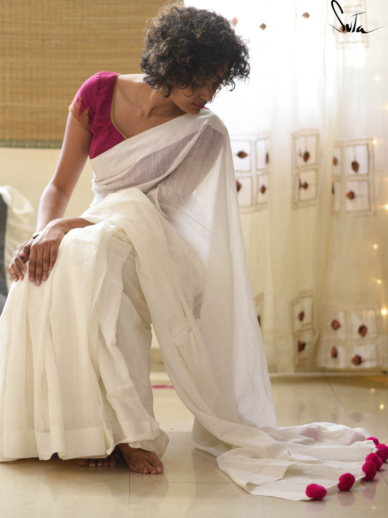 White cotton and silk threads with pink tassels