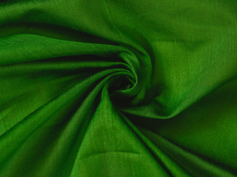 deep blue sky and a green feather